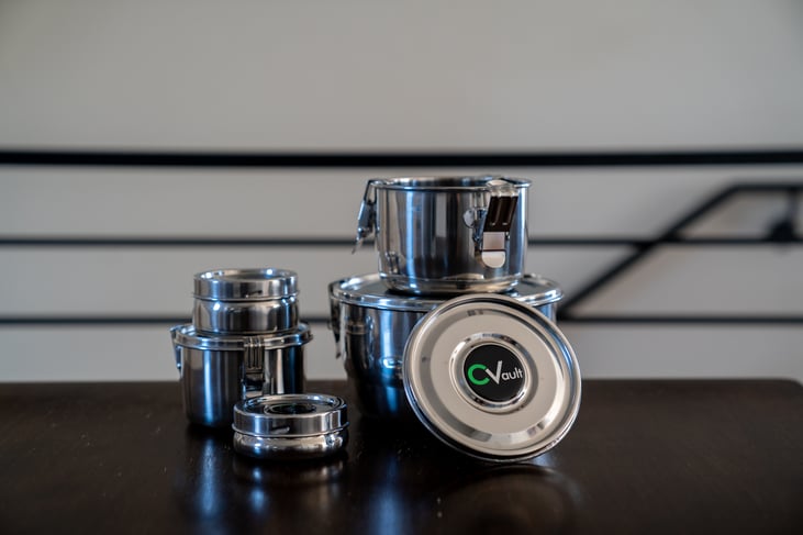 CVault storage containers stacked on a table highlighting a range of sizes.